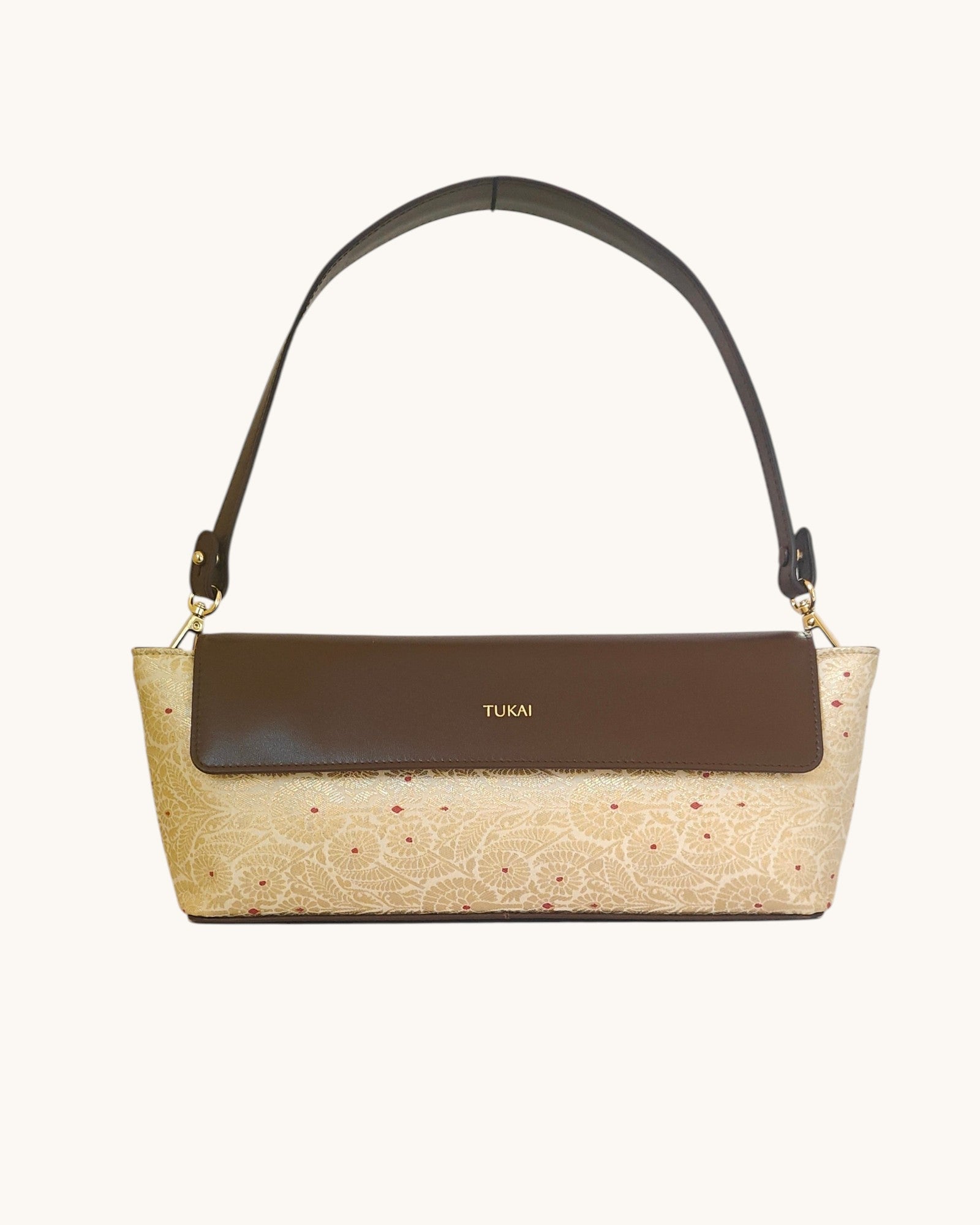 The Statement Baguette (Rum Raisin Leather x Ivory dust)